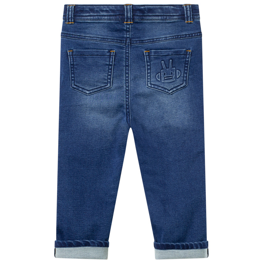 Jean effet used avec broderies contrastées 